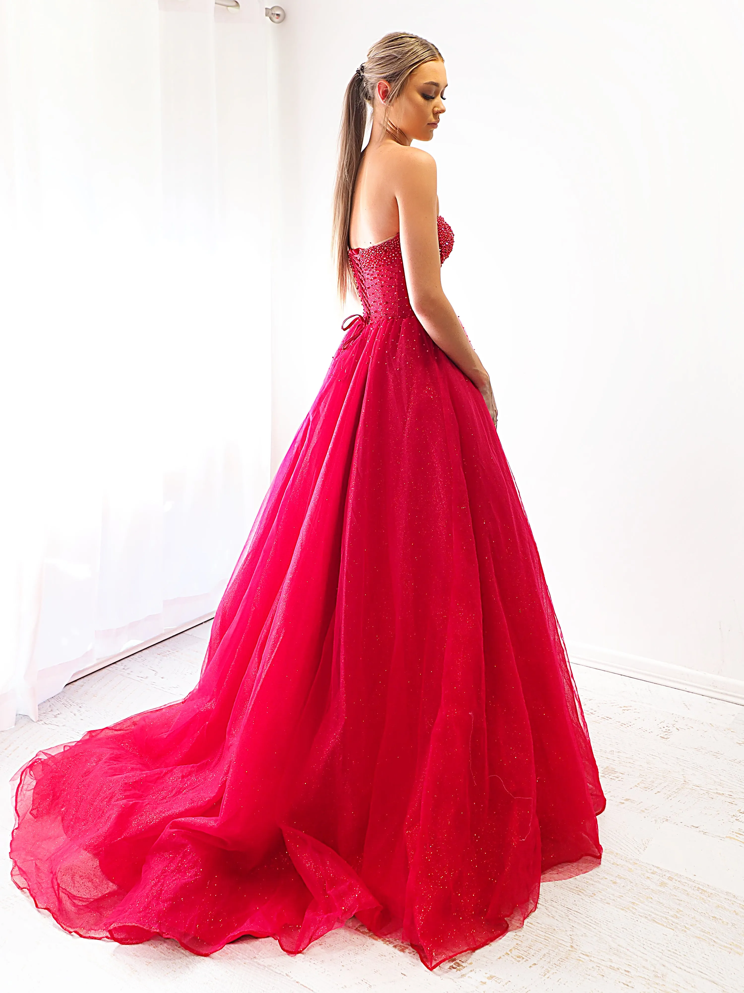 Sparkling dark red tulle dress with beaded top